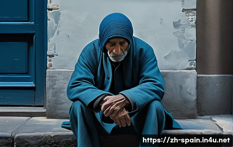 파블로 피카소 생애와 작품 - A melancholic blue-hued painting inspired by Picasso&rsquo;s Blue Period, featuring a solitary, somber fig...
